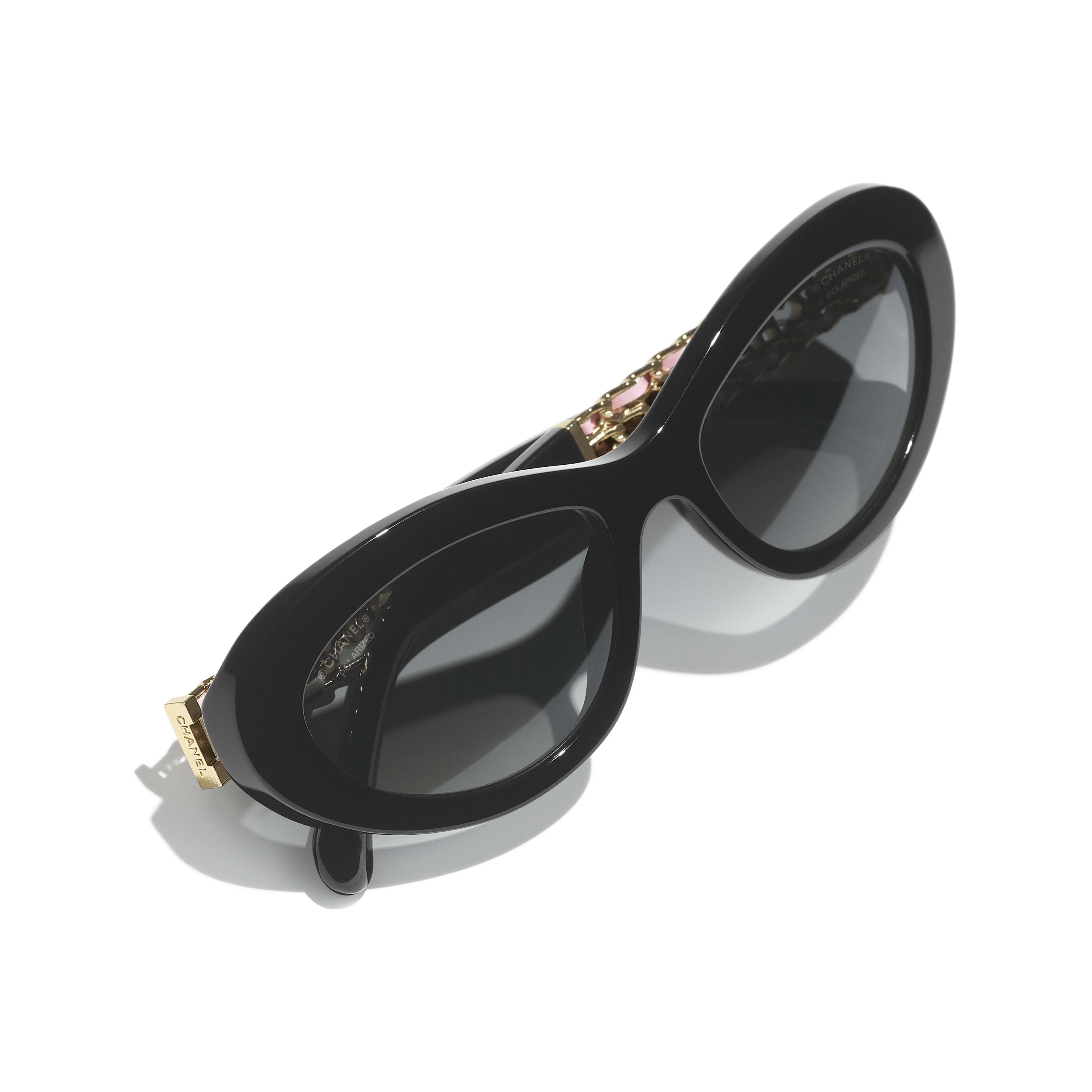 CHANEL 太阳眼镜: 猫眼形太阳眼镜, 醋酯纤维、金属与小牛皮5538Q